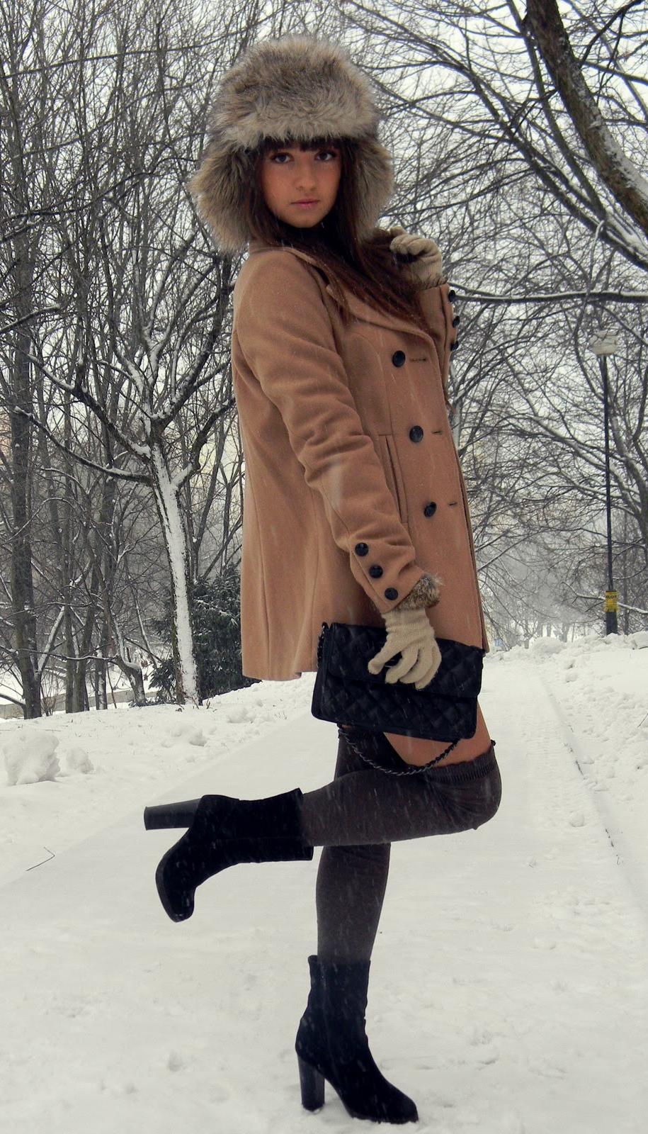 Auburn Girl wearing Fur Hat and Purple Opaque Stockings